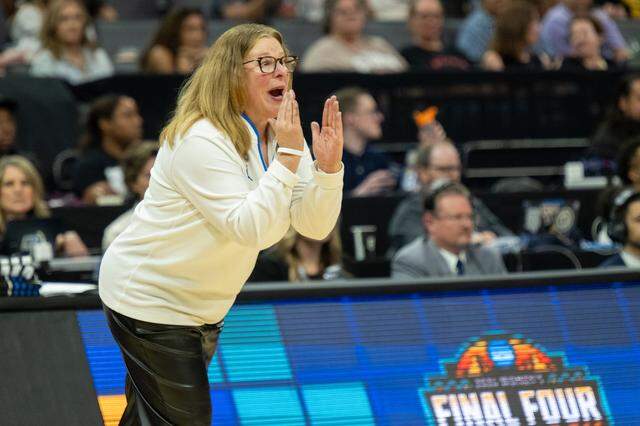 UCLA Bruins head coach Cori Close yells to her team during the NCAA Women’s Basketball Tournament Sweet 16 game at Golden 1 Center in Sacramento on Friday.